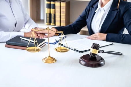Man and woman at attorney desk